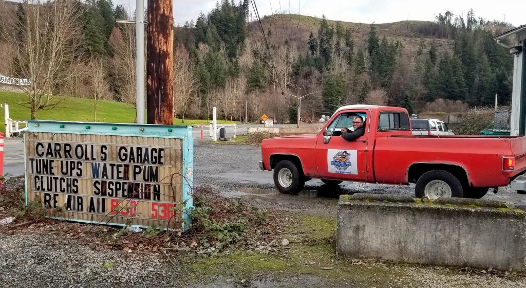 Construction debris removal truck loading remodeling waste in Puyallup WA